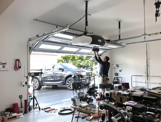 Maywood Garage Door Repair specialist installing smart garage door opener system in Maywood home
