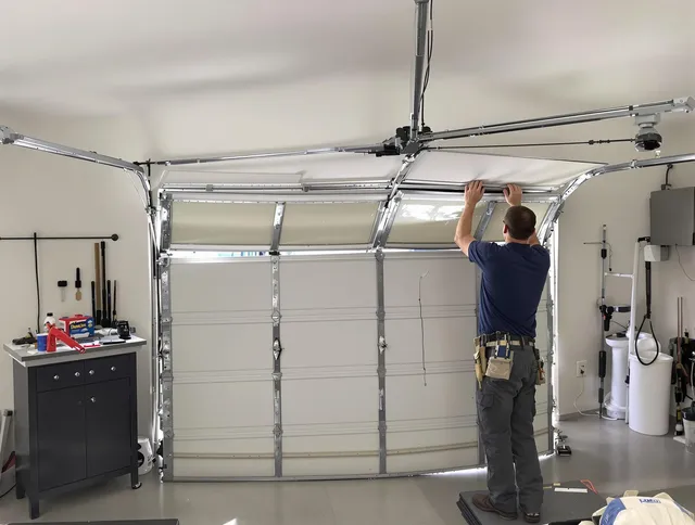 Maywood Garage Door Repair specialist performing precise section replacement on Maywood garage door