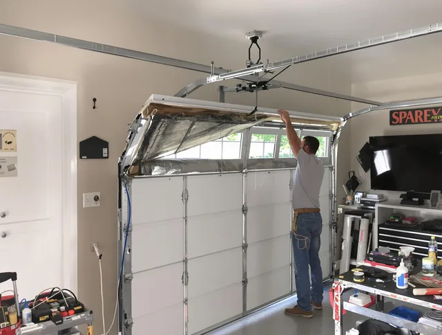 Garage door section replacement by Maywood Garage Door Repair in Maywood