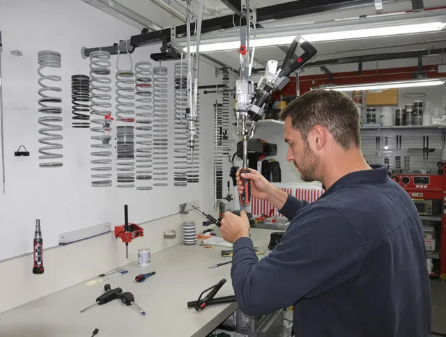Maywood Garage Door Repair safety certified technician performing precision spring replacement in Maywood